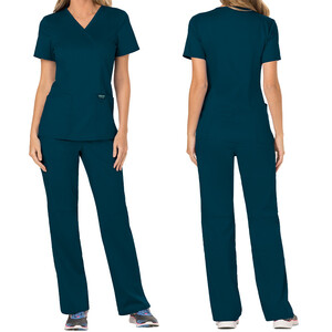 Медицинска туника REVOLUTION WWE610 - карибско син Медицинска туника REVOLUTION WWE610 - карибско син